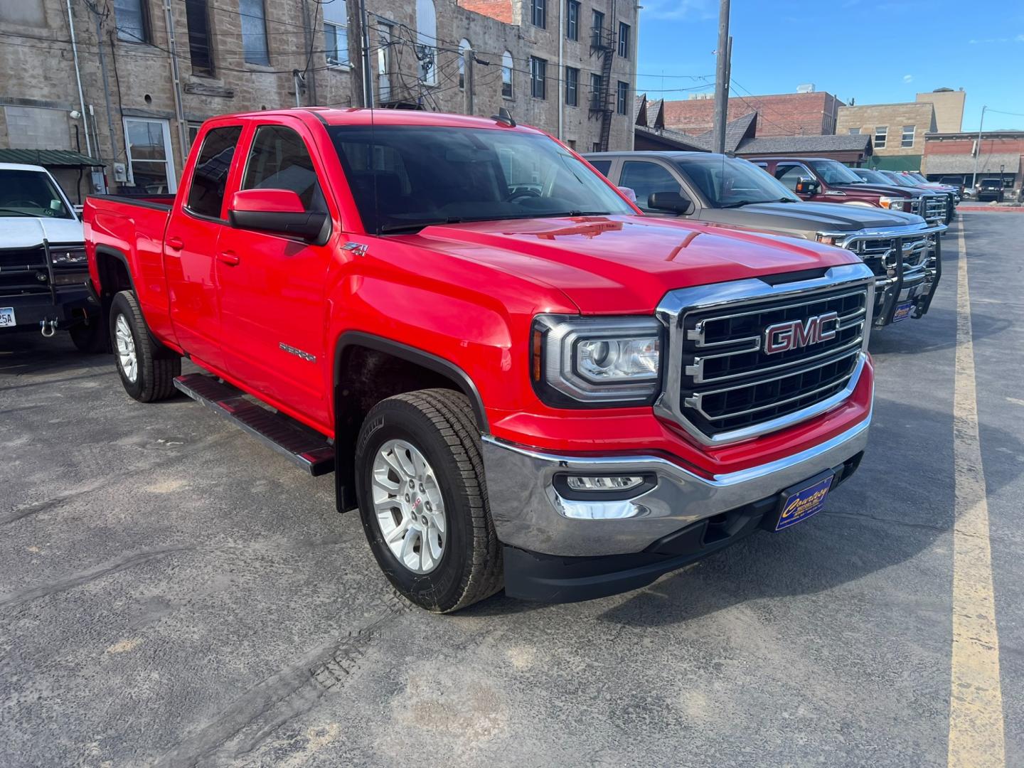 2019 Red /Charcoal GMC Sierra 1500 SLE (2GTV2MEC9K1) with an 5.3L V8 engine, Automatic transmission, located at 116 5th Avenue South, Lewistown, MT, 59457, 47.063877, -109.427879 - Discover the rugged versatility of the 2019 GMC Sierra 1500 SLE Double Cab 4WD. This truck is built to handle tough tasks with ease, whether you're tackling a worksite or heading off-road for adventure. Equipped with a powerful 5.3L V8 engine and advanced 4WD system, the Sierra 1500 SLE delivers im - Photo#0